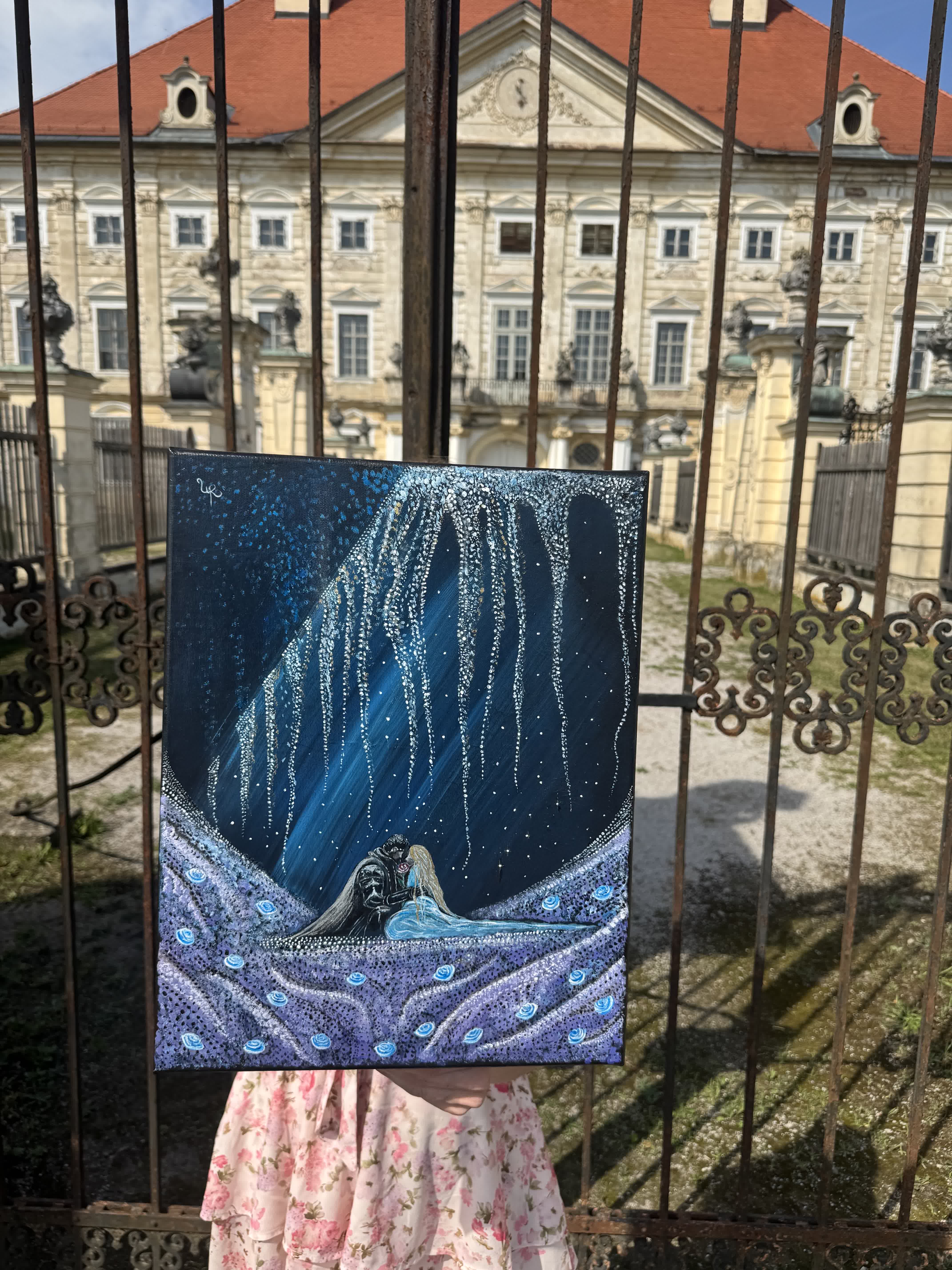 'Blossoming Love' held up against the castle gates