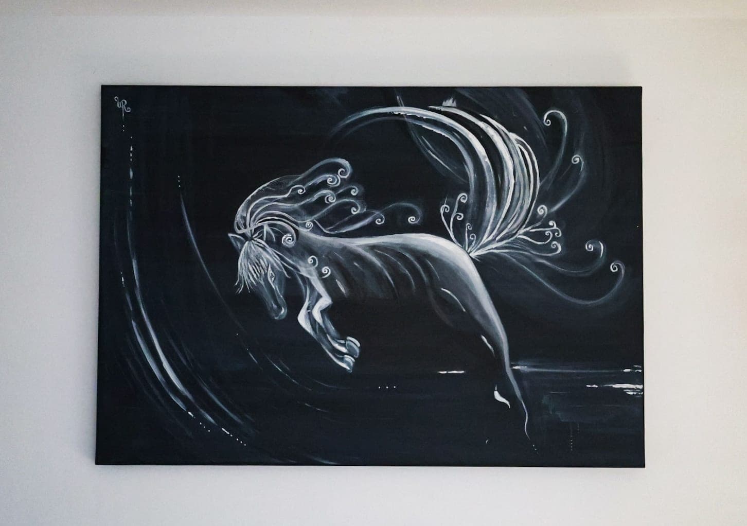 "Wild Spirit" in full, on a white wall
